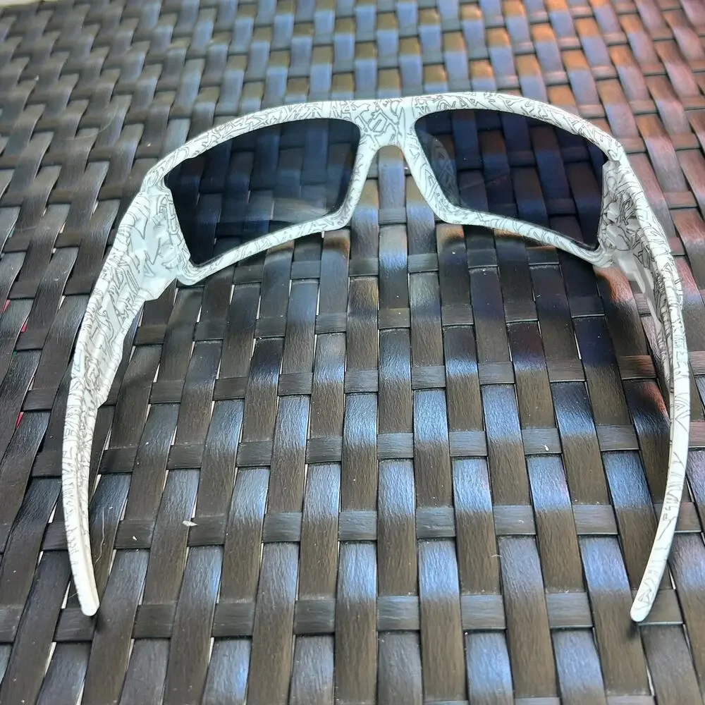 Oakley Oil Rig sunglasses  White frame covered in black graphic text Gray lens